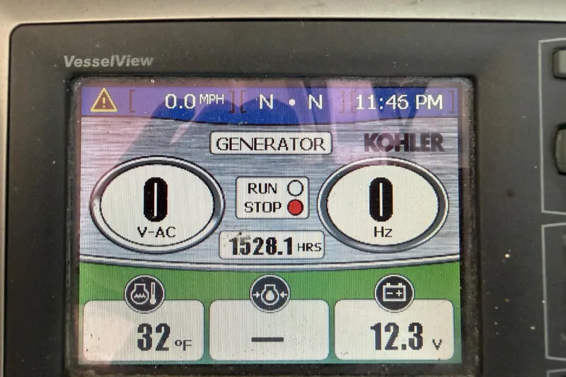 Slide: The Image of VesselView display on 2008 Sea Ray 38 Sundancer showing generator status and temperature. - 18