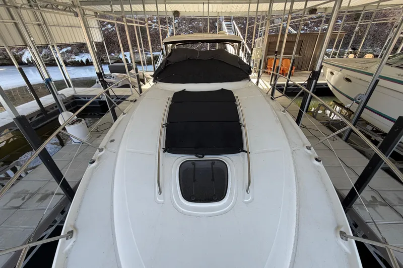 Slide: The Image of 2008 Sea Ray 38 Sundancer yacht docked in covered marina. - 8