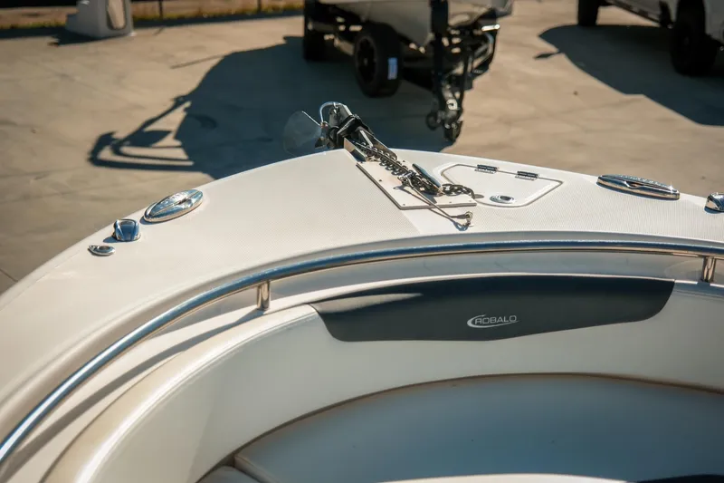 Slide: The Image of 2020 Robalo R242 Center Console boat bow with anchor and logo. - 20