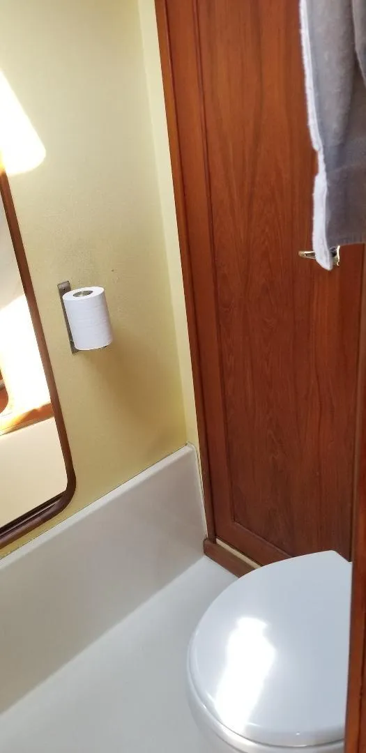 Slide: The Image of 1989 Bayliner 3888 Motoryacht bathroom interior view. - 17