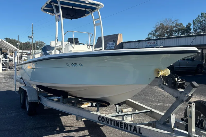 Slide: The Image of 2001 Key West 210 Bay Reef boat on trailer at dealership. - 10