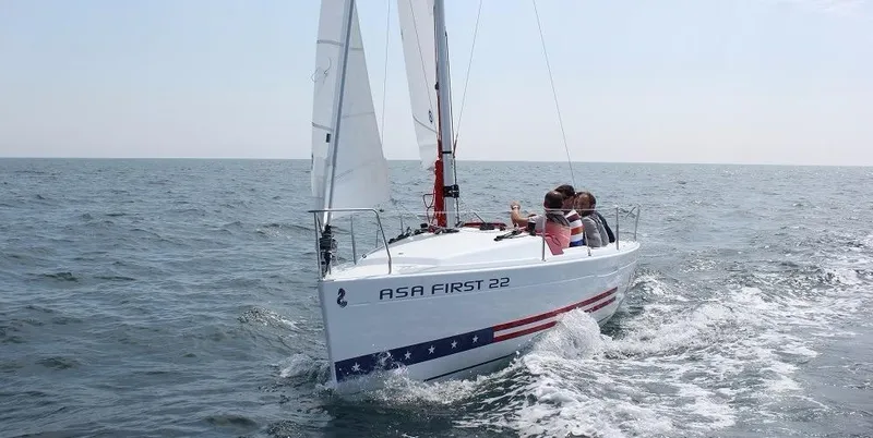 Slide: The Image of Beneteau First 22 sailboat, 2016 model, sailing on open sea. - 9