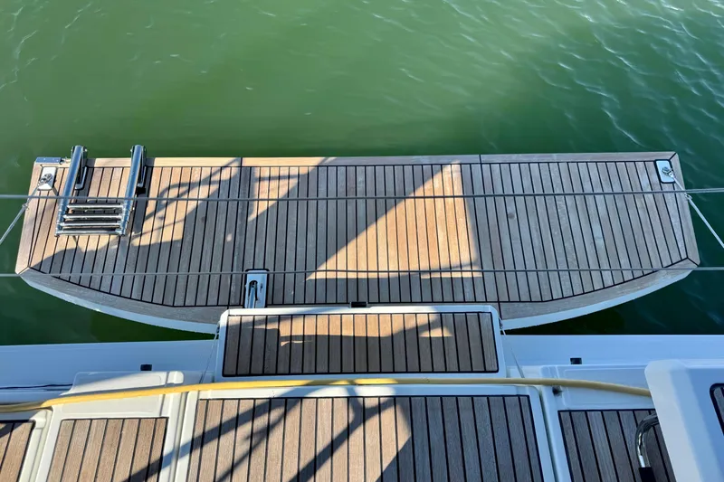 Slide: The Image of 2019 Beneteau Oceanis 41.1 yacht swim platform with teak decking and ladder. - 15
