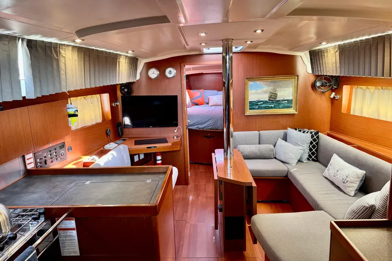 Slide: The Image of Luxurious interior of 2019 Beneteau Oceanis 41.1 yacht with cozy seating and modern amenities. - 25