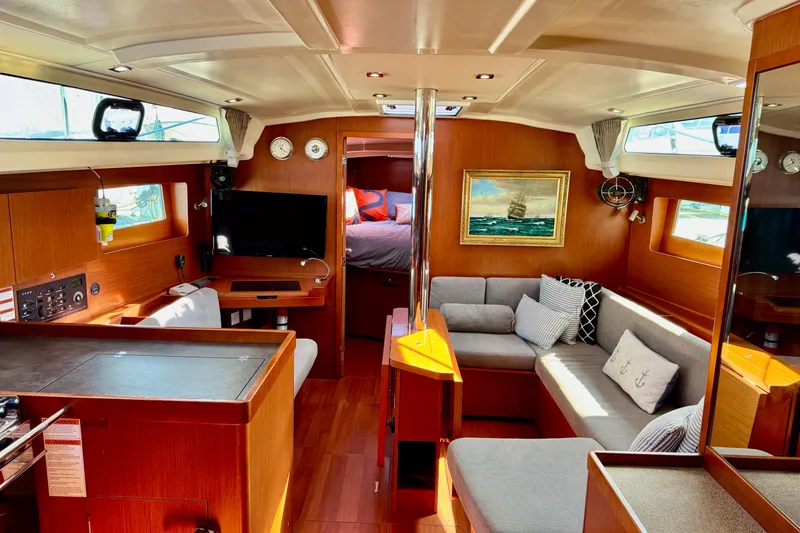 Slide: The Image of Interior of 2019 Beneteau Oceanis 41.1 yacht with cozy seating and modern amenities. - 26