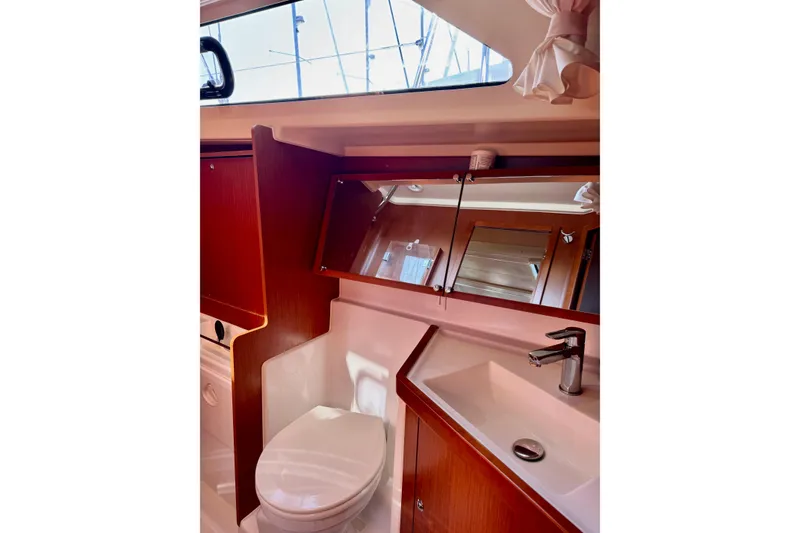 Slide: The Image of Beneteau Oceanis 41.1 2019 yacht bathroom with modern sink and toilet. - 47