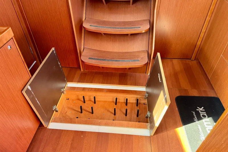 Slide: The Image of Interior of 2019 Beneteau Oceanis 41.1 yacht with open storage compartment. - 53