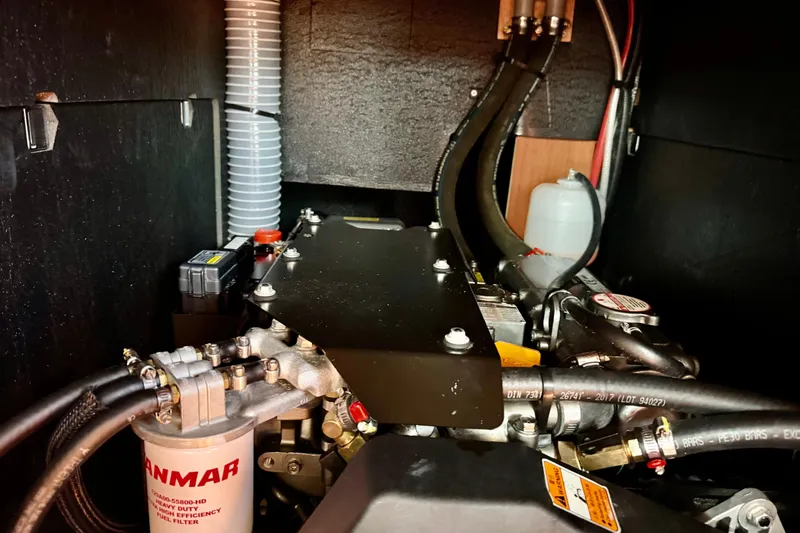 Slide: The Image of Engine compartment of 2019 Beneteau Oceanis 41.1 sailboat, featuring Yanmar components. - 59