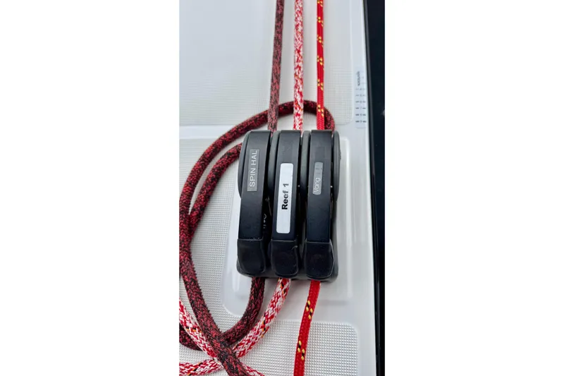 Slide: The Image of Close-up of rope clutches on a 2019 Beneteau Oceanis 41.1 sailboat. - 62