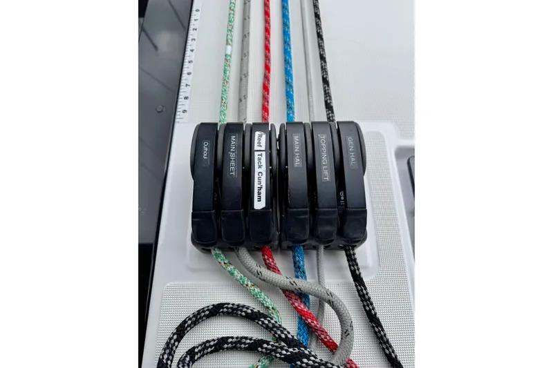 Slide: The Image of Close-up of sailing rope clutches on a 2019 Beneteau Oceanis 41.1 yacht. - 63