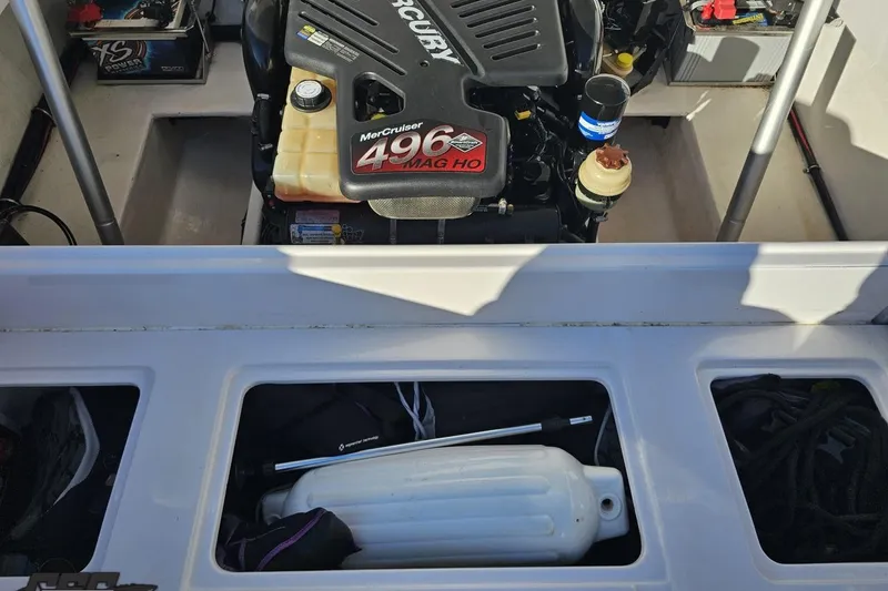 Slide: The Image of 2008 Donzi 27 ZR boat engine compartment with MerCruiser 496 MAG HO engine. - 100