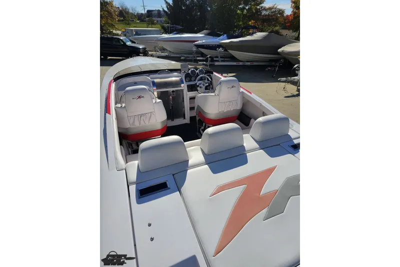 Slide: The Image of 2008 Donzi 27 ZR speedboat interior with sleek white and red seating. - 41