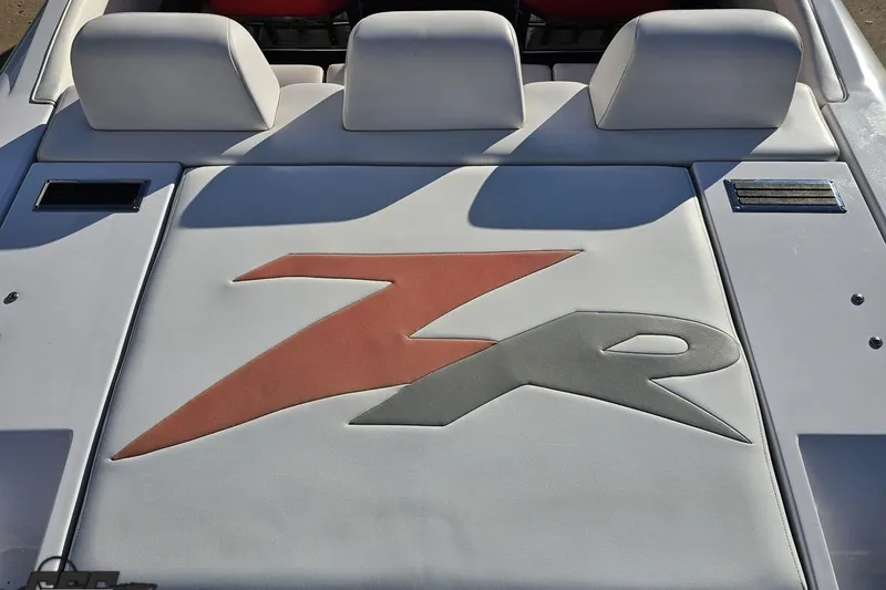 Slide: The Image of 2008 Donzi 27 ZR boat interior with logo on white upholstery. - 43