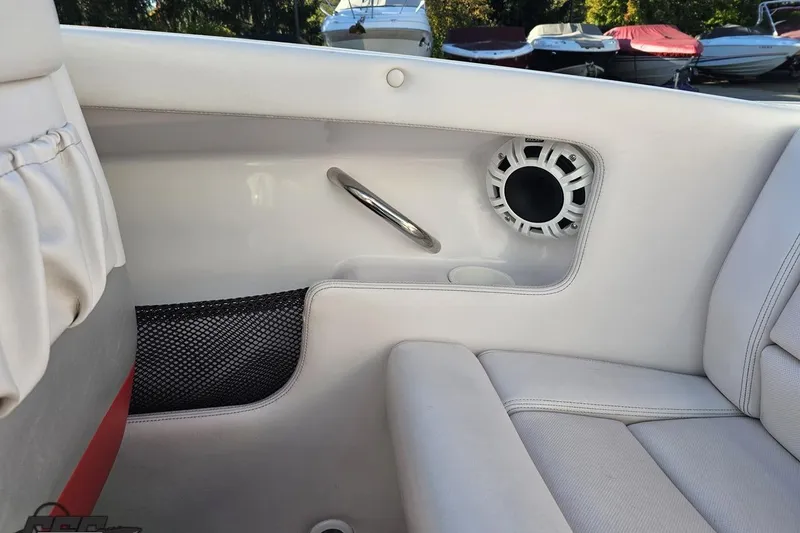 Slide: The Image of Interior of 2008 Donzi 27 ZR boat with speaker and seating detail. - 52