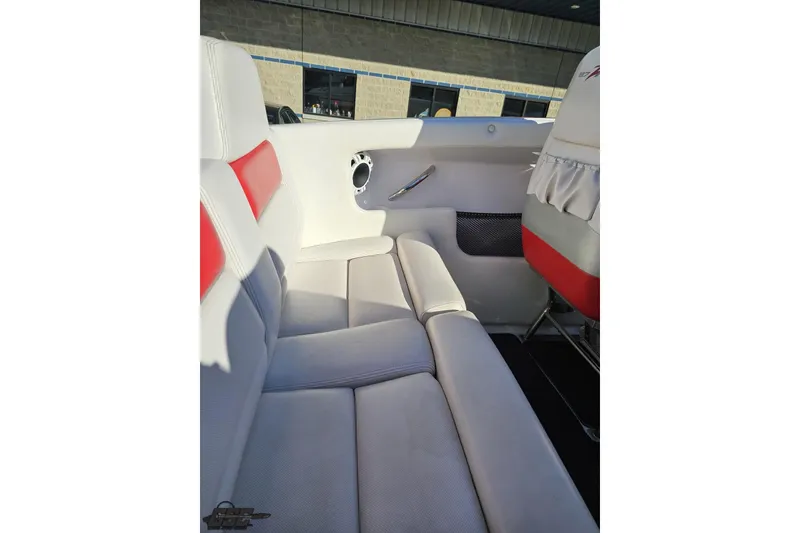 Slide: The Image of Interior of 2008 Donzi 27 ZR boat with white and red seating. - 55