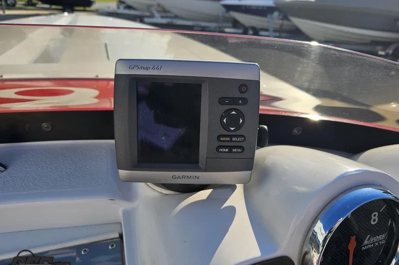 Slide: The Image of Garmin GPSmap 441 on 2008 Donzi 27 ZR boat dashboard, with Livorsi gauge. - 66