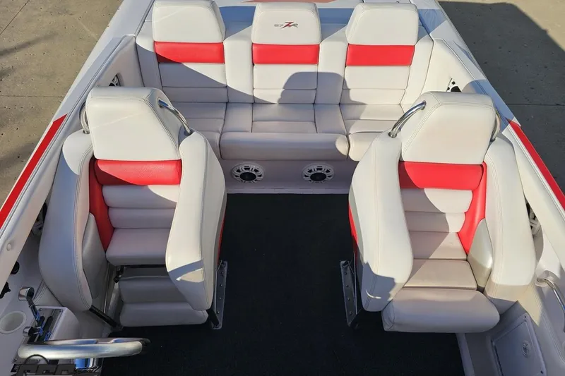Slide: The Image of Interior of a 2008 Donzi 27 ZR boat with white and red seating. - 75