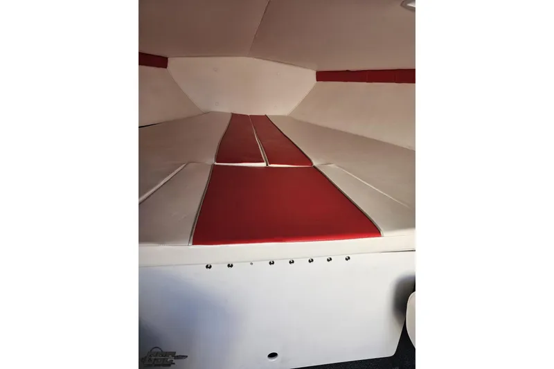 Slide: The Image of Interior of 2008 Donzi 27 ZR boat with red and white seating. - 82