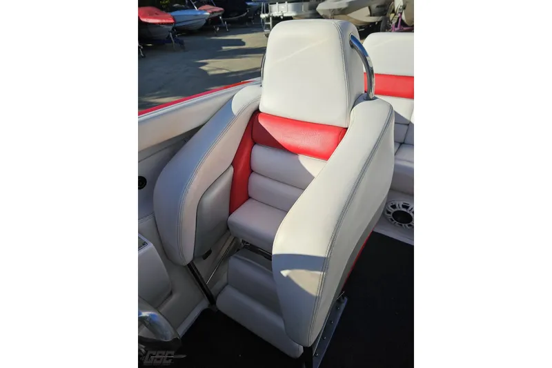 Slide: The Image of 2008 Donzi 27 ZR boat seat with red and gray upholstery. - 91