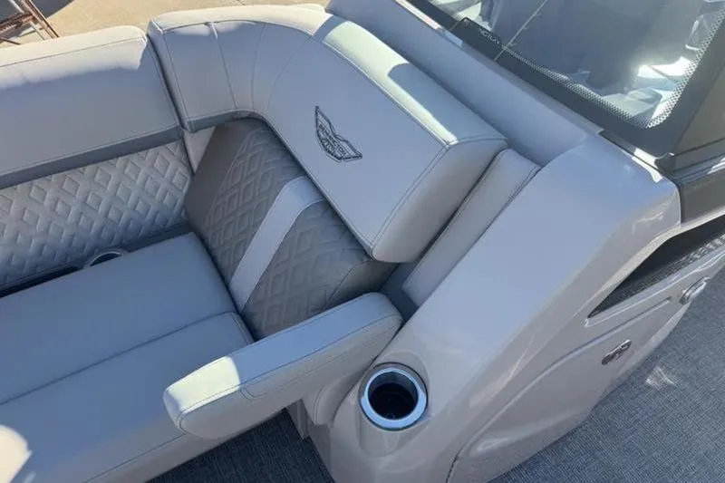 Slide: The Image of Luxurious seating on 2025 Bennington 26 MFB-SPS boat with elegant design and cup holder. - 10