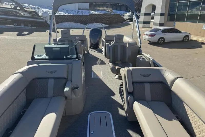 Slide: The Image of 2025 Bennington 26 MFB-SPS pontoon boat with luxurious seating and modern design. - 11