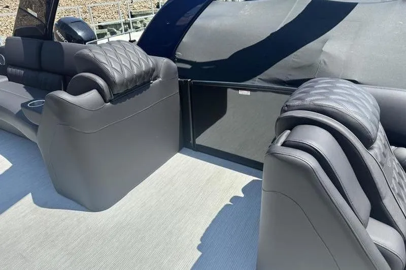 Slide: The Image of Luxurious seating on 2026 Bennington 30 QSBAX boat with quilted upholstery. - 14