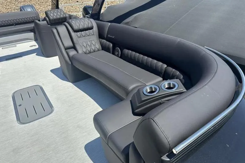 Slide: The Image of Luxurious seating on 2026 Bennington 30 QSBAX pontoon boat with cup holders and sleek design. - 15