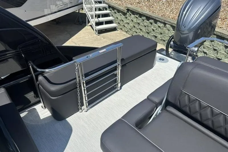 Slide: The Image of 2026 Bennington 30 QSBAX boat interior with sleek seating and modern design. - 8