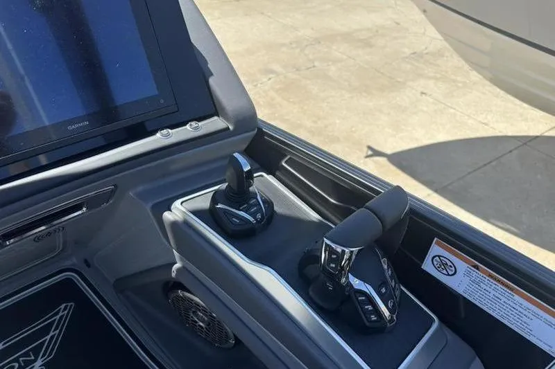 Slide: The Image of Control panel of 2026 Bennington 30 QSBAX boat with joystick and throttle. - 9