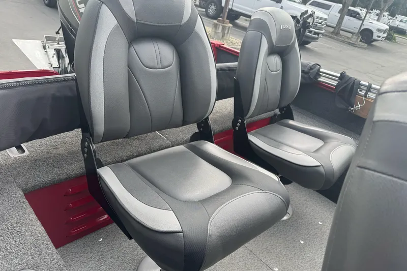 Slide: The Image of 2021 Lund 1650 Angler SS boat interior with two gray cushioned seats. - 10