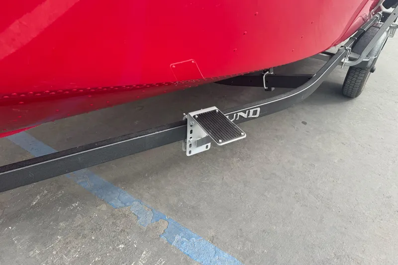 Slide: The Image of Red 2021 Lund 1650 Angler SS boat on trailer with step platform. - 4