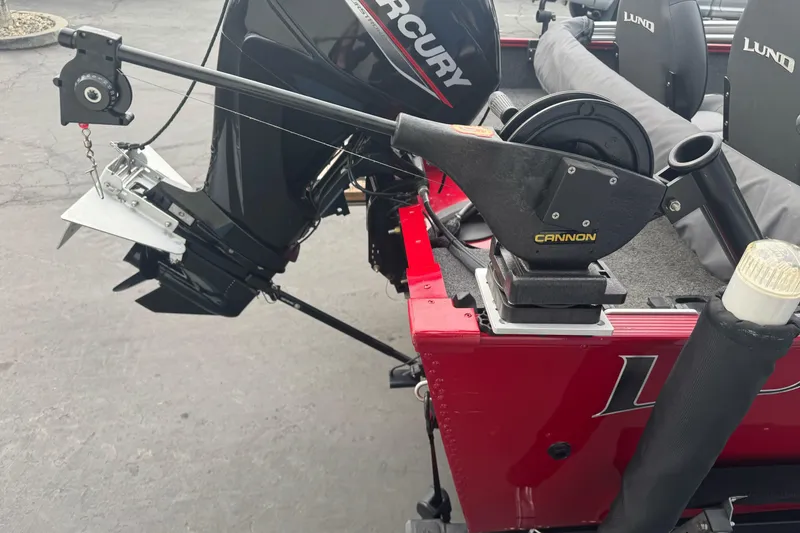 Slide: The Image of 2021 Lund 1650 Angler SS boat with Mercury engine and Cannon downrigger. - 8