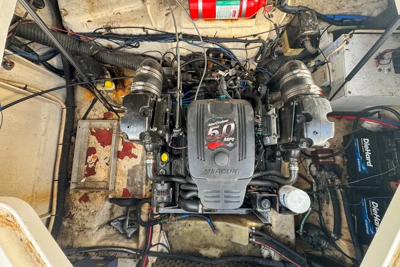 Slide: The Image of Engine compartment of a 2007 Sea Ray 240 Sundancer with MerCruiser 5.0 MPI engine. - 120
