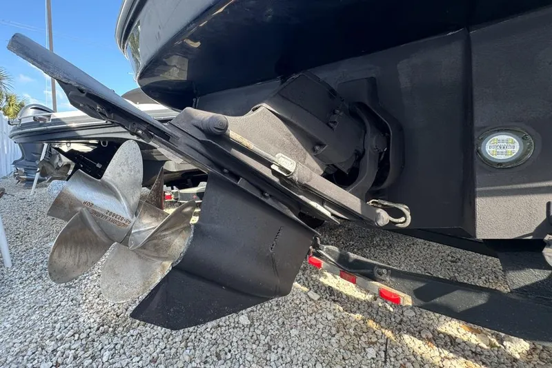 Slide: The Image of 2007 Sea Ray 240 Sundancer boat propeller and stern drive detail. - 135