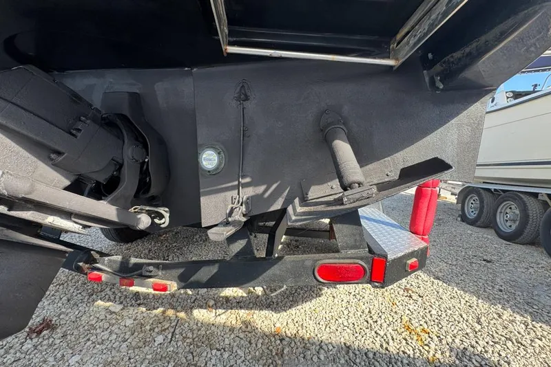 Slide: The Image of Rear view of a 2007 Sea Ray 240 Sundancer boat on a trailer. - 136