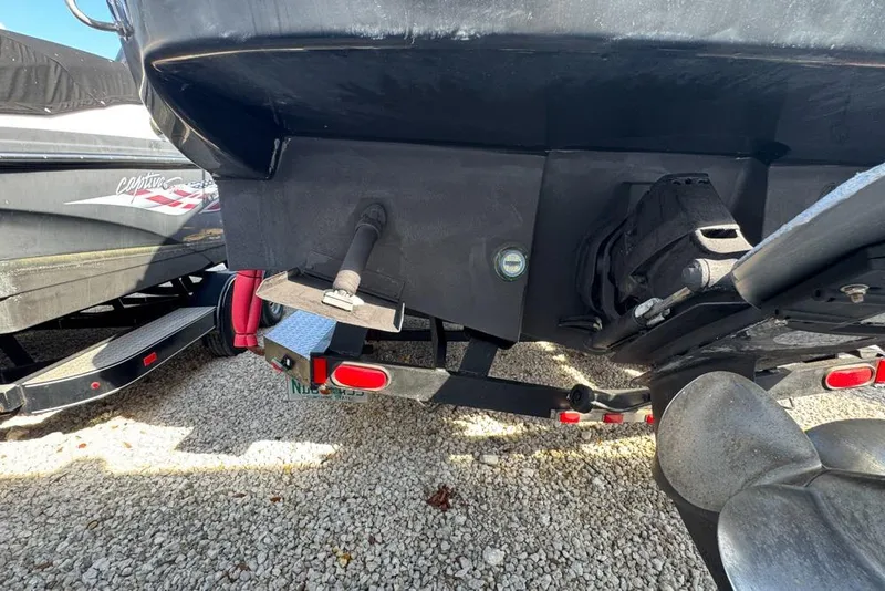 Slide: The Image of Rear view of a 2007 Sea Ray 240 Sundancer boat on a trailer. - 137