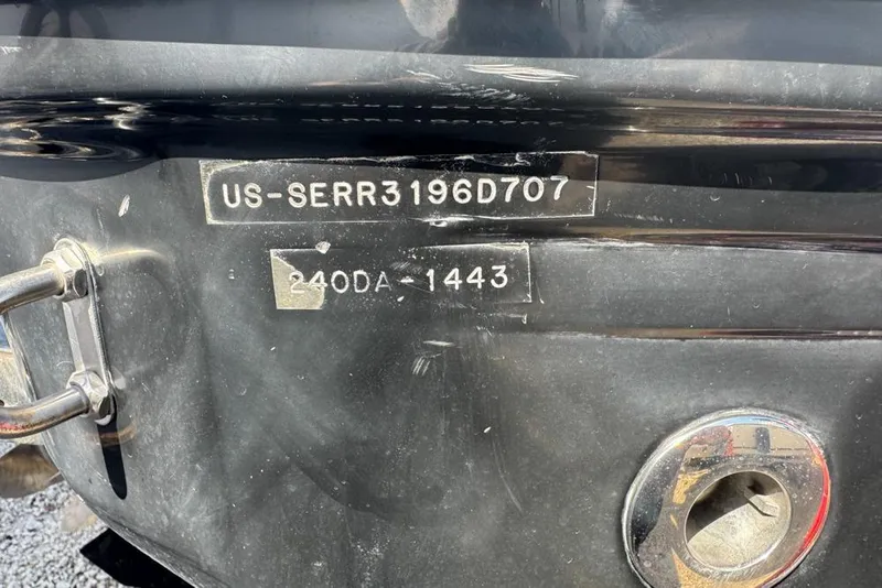 Slide: The Image of 2007 Sea Ray 240 Sundancer boat hull identification number and model details. - 90