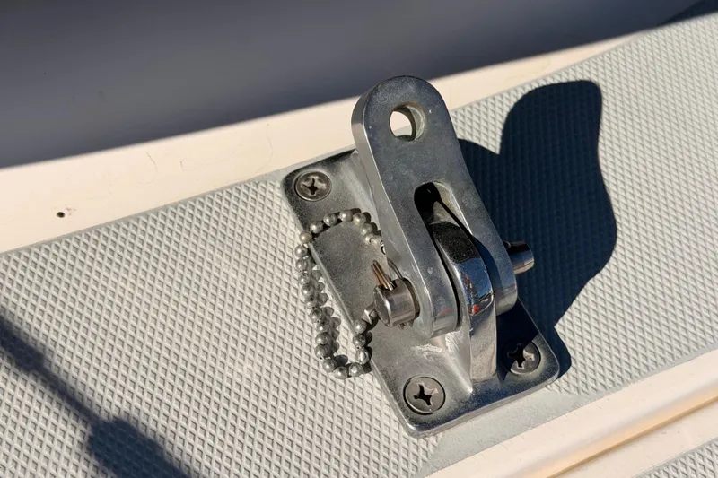 Slide: The Image of Stainless steel fitting on 2005 Hunter Passage 456 boat deck, close-up view. - 19