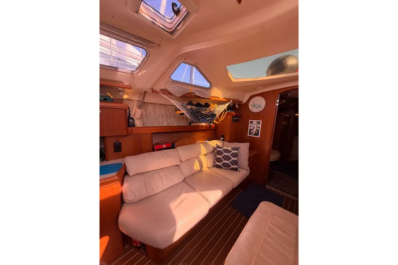 Slide: The Image of Interior of 2005 Hunter Passage 456 yacht with cozy seating and skylights. - 49