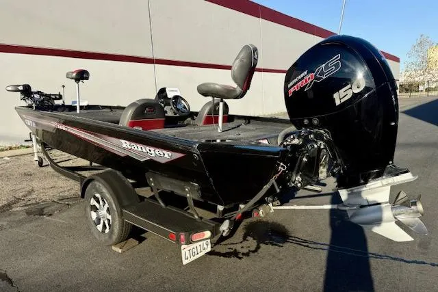 Slide: The Image of 2017 Ranger RT198P boat with Mercury 150 Pro XS engine, parked on a trailer. - 1