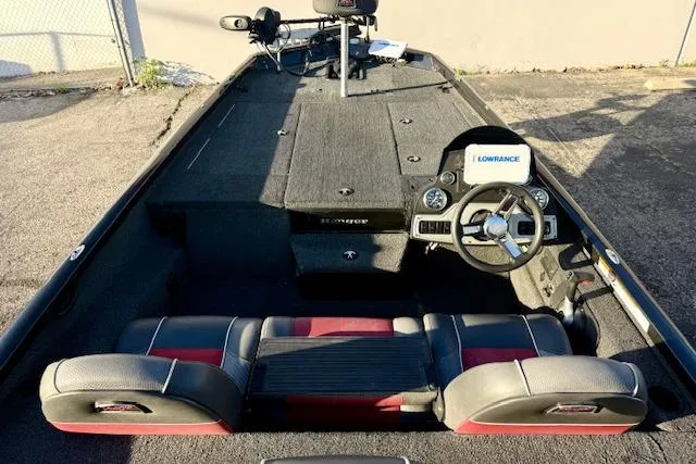 Slide: The Image of 2017 Ranger RT198P boat interior with steering wheel and Lowrance electronics. - 7