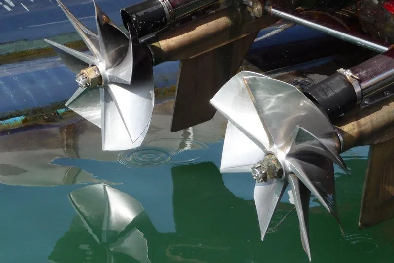 Slide: The Image of Propellers of 2002 Hallett Custom High Performance Express Cruiser in water. - 60