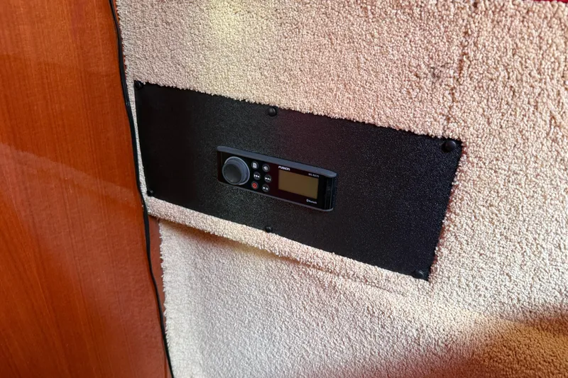 Slide: The Image of Control panel on 2002 Hallett Custom High Performance Express Cruiser interior wall. - 69