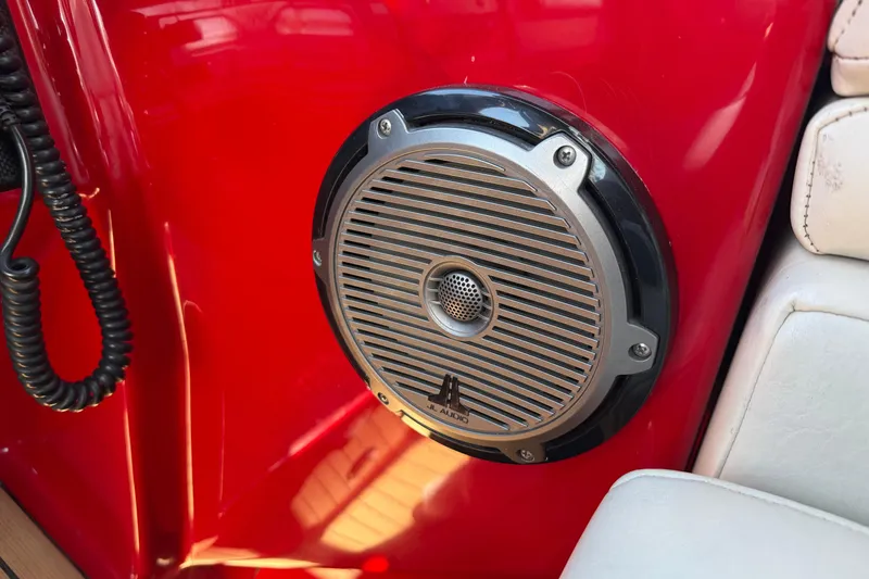Slide: The Image of Speaker on red Hallett 2002 Custom High Performance Express Cruiser interior. - 72