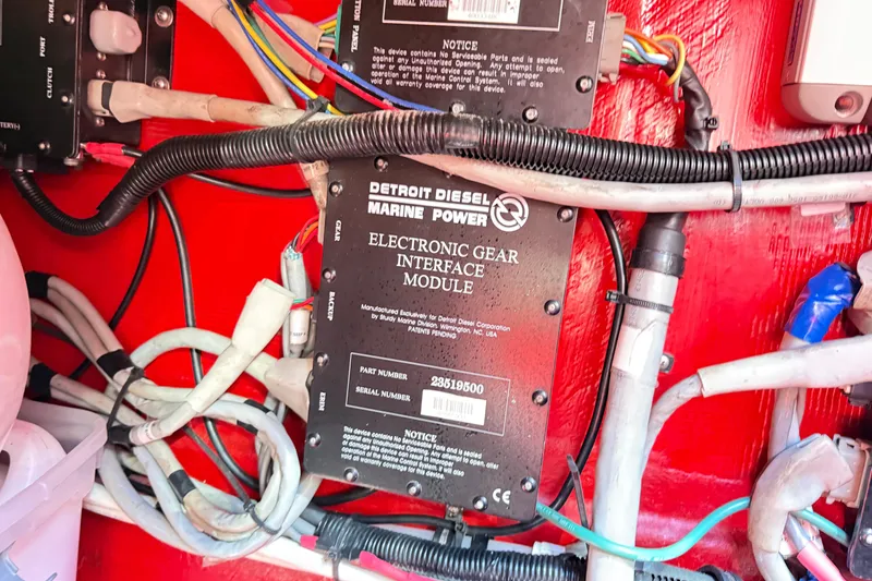 Slide: The Image of Engine compartment of 2002 Hallett Cruiser with Detroit Diesel electronic gear module. - 83