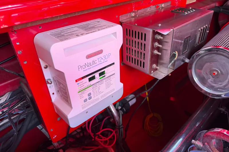 Slide: The Image of ProNautic 12-30P charger in 2002 Hallett Express Cruiser engine compartment. - 86