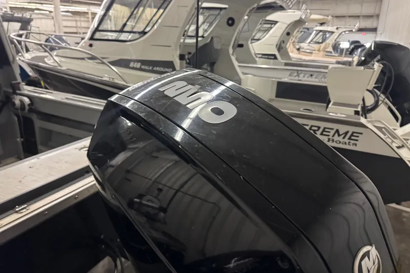Slide: The Image of 2019 Hewescraft 220 Ocean Pro ET Hard Top in a boat showroom. - 17