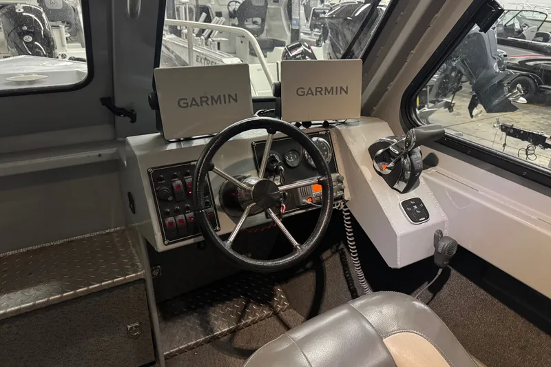 Slide: The Image of 2019 Hewescraft 220 Ocean Pro ET Hard Top cockpit with Garmin navigation displays. - 28