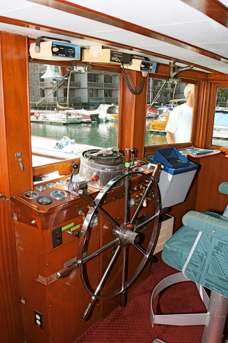 Slide: The Image of Helm of a classic 1946 J.M. Martinac yacht. - 19