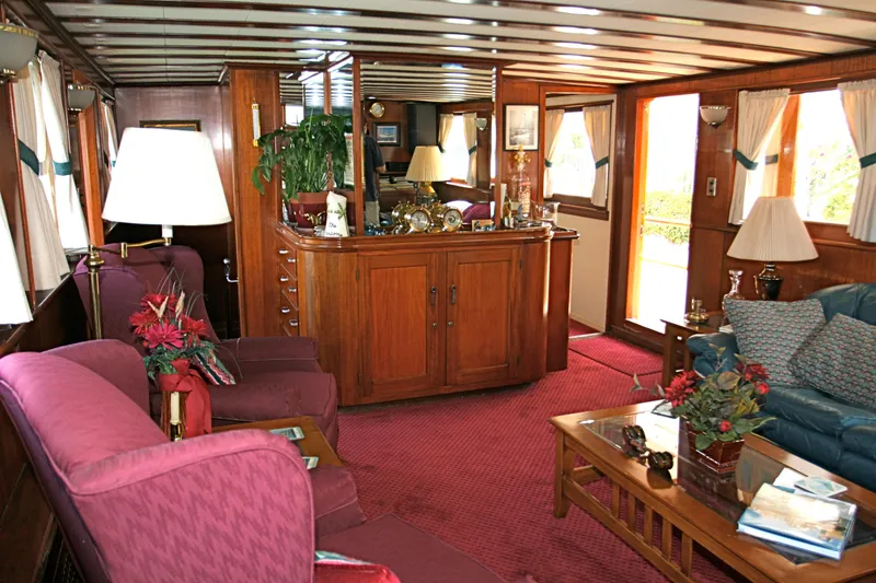 Slide: The Image of Luxurious interior of a 1946 classic motor yacht with wooden furnishings. - 26